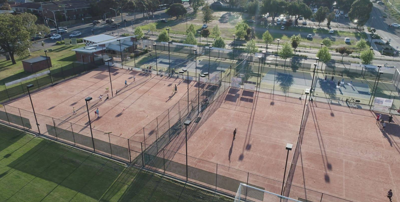 Players and coaches on court at East Coburg Tennis Club